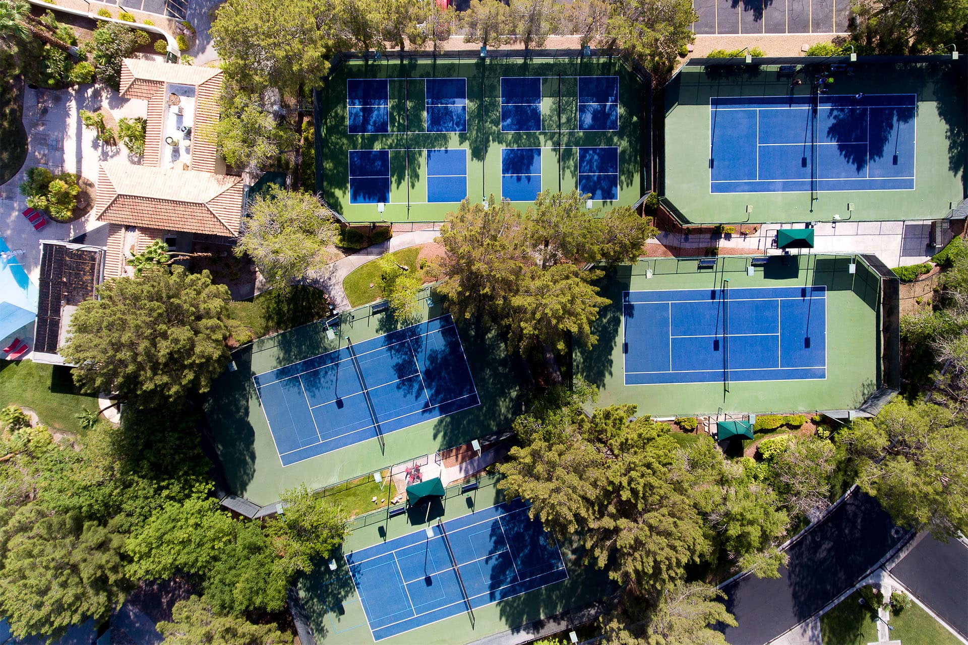 Tennis court with rackets and balls